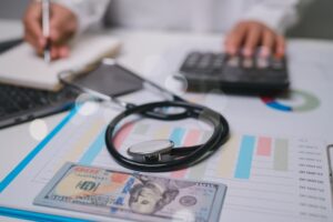 dollar bills, and analytical tools, emphasizing the importance of managing medical costs effectively